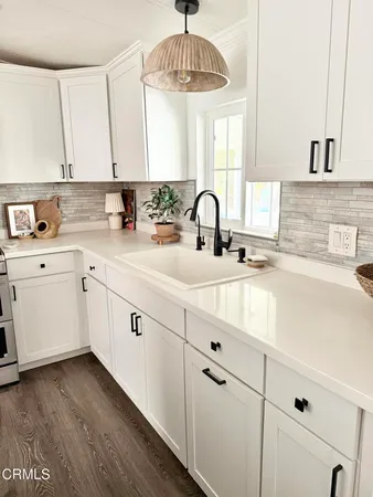 a view of a room with toys and flowers