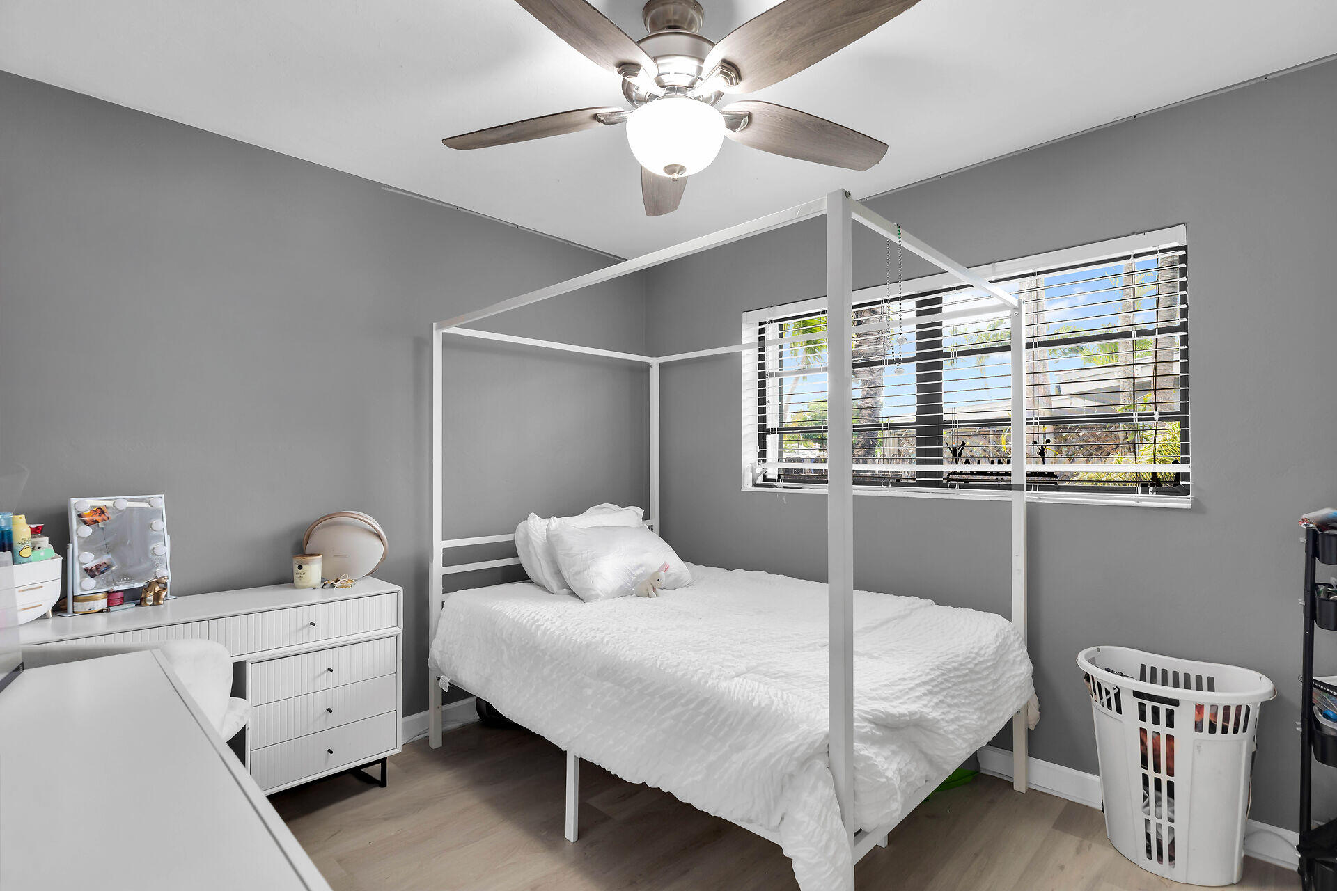34 Key Haven Road Key Haven, FL 33040 - Photo 25 of 34 a bedroom with a bed and a chandelier