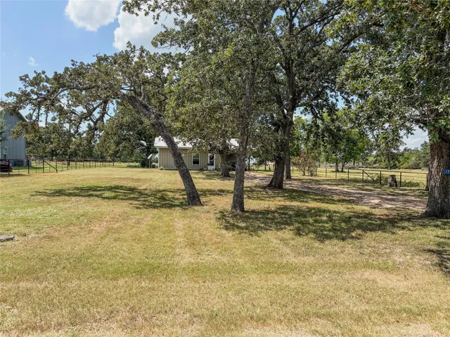 a house view with a garden space