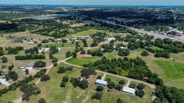 a view of a yard with tree s
