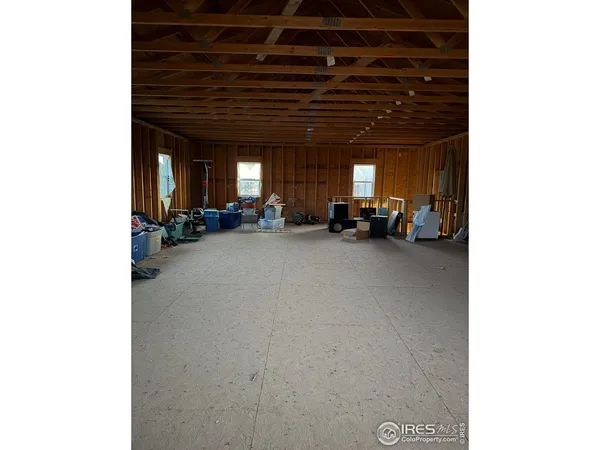 a view of a room with furniture