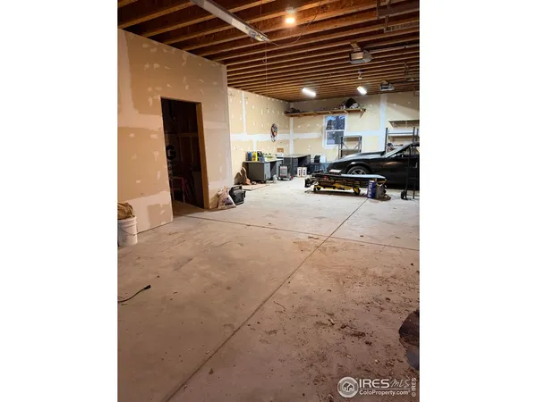 a room with furniture and a garage