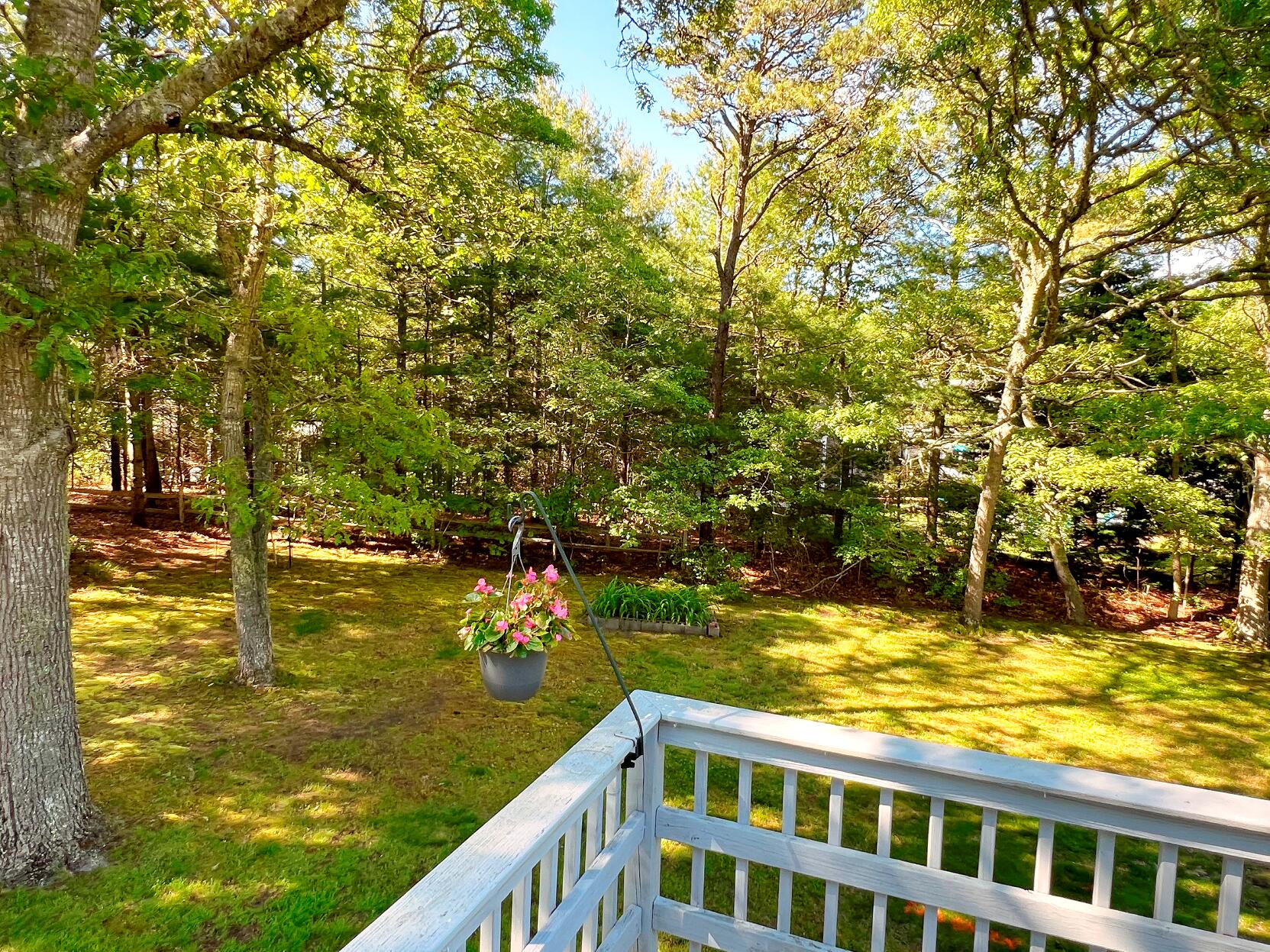199 Timberlane Drive Brewster, MA 02631 - Photo 11 of 44 a view of ocean from a balcony