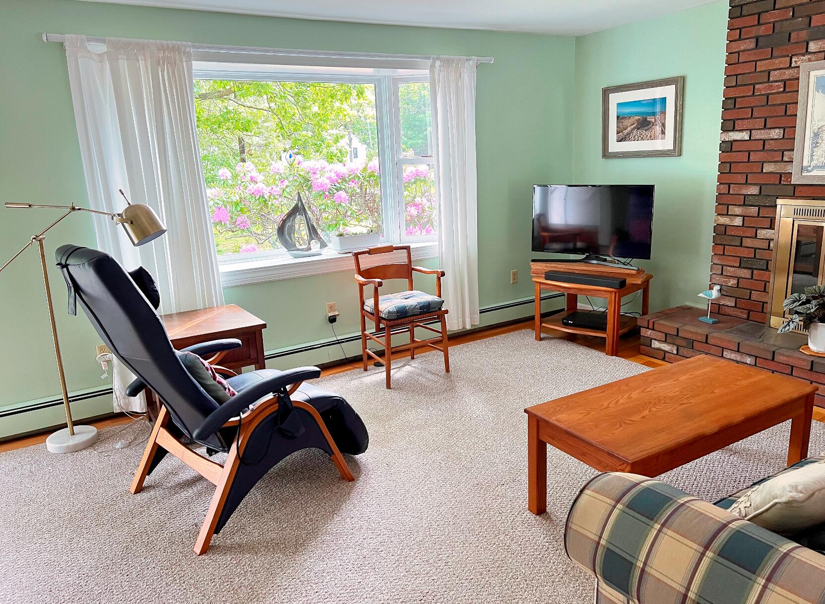 199 Timberlane Drive Brewster, MA 02631 - Photo 15 of 44 a room with furniture and a flat screen tv