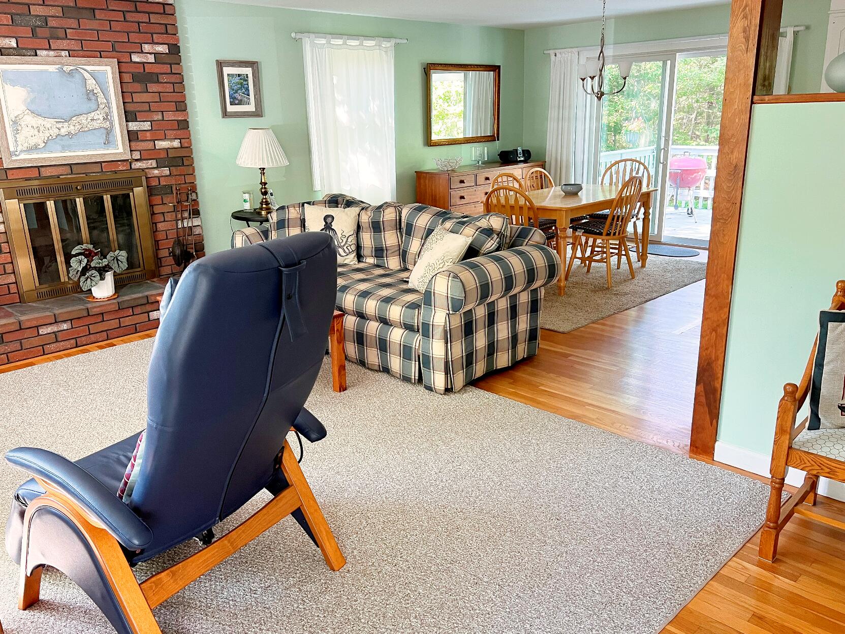 199 Timberlane Drive Brewster, MA 02631 - Photo 16 of 44 a living room with furniture rug and wooden floor