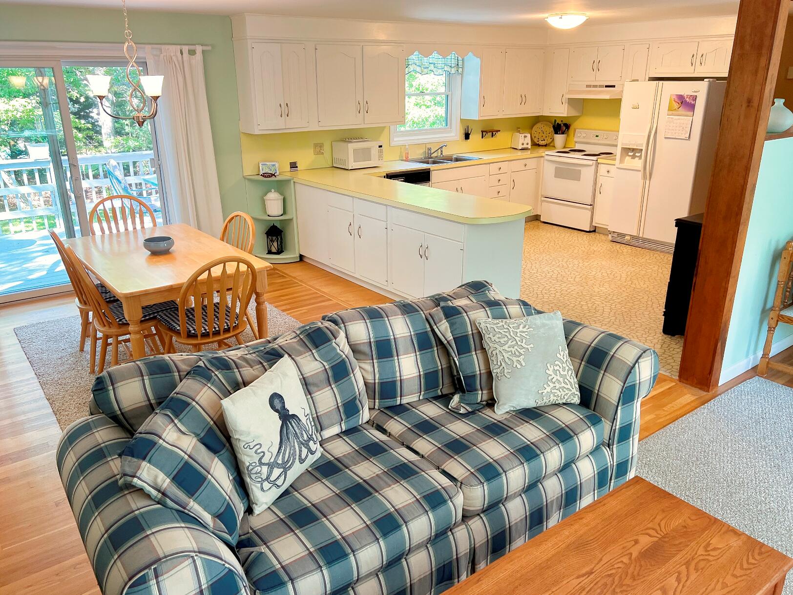 199 Timberlane Drive Brewster, MA 02631 - Photo 17 of 44 a bedroom with furniture and a large window