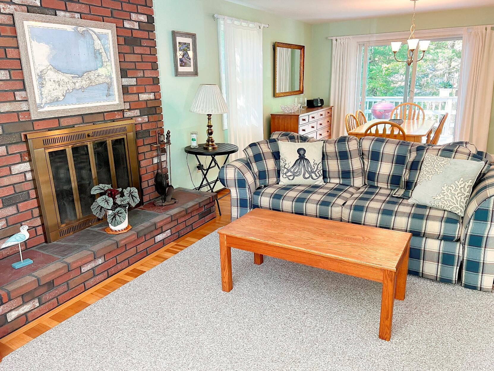 199 Timberlane Drive Brewster, MA 02631 - Photo 18 of 44 a reading room with furniture and a floor to ceiling window