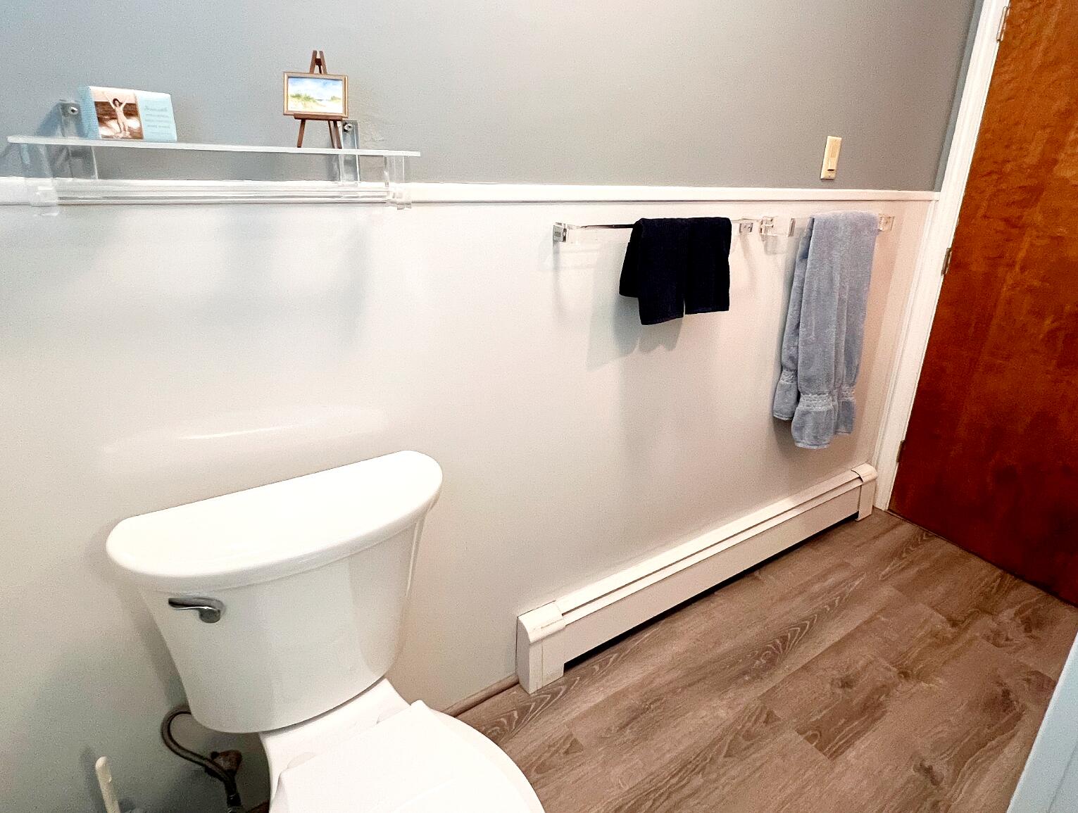 199 Timberlane Drive Brewster, MA 02631 - Photo 33 of 44 a white toilet sitting next to a shower