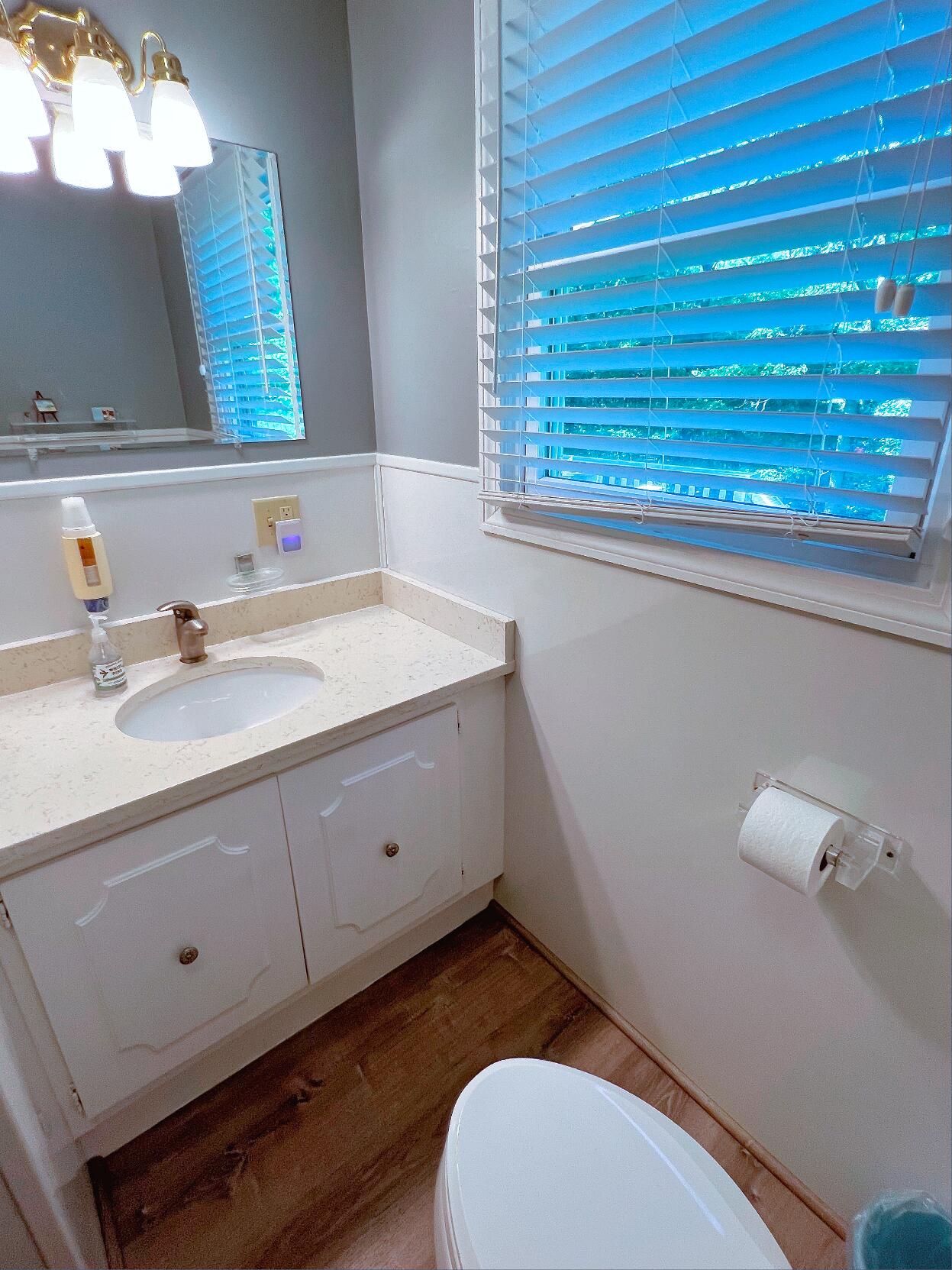 199 Timberlane Drive Brewster, MA 02631 - Photo 34 of 44 a bathroom with a sink and a toilet