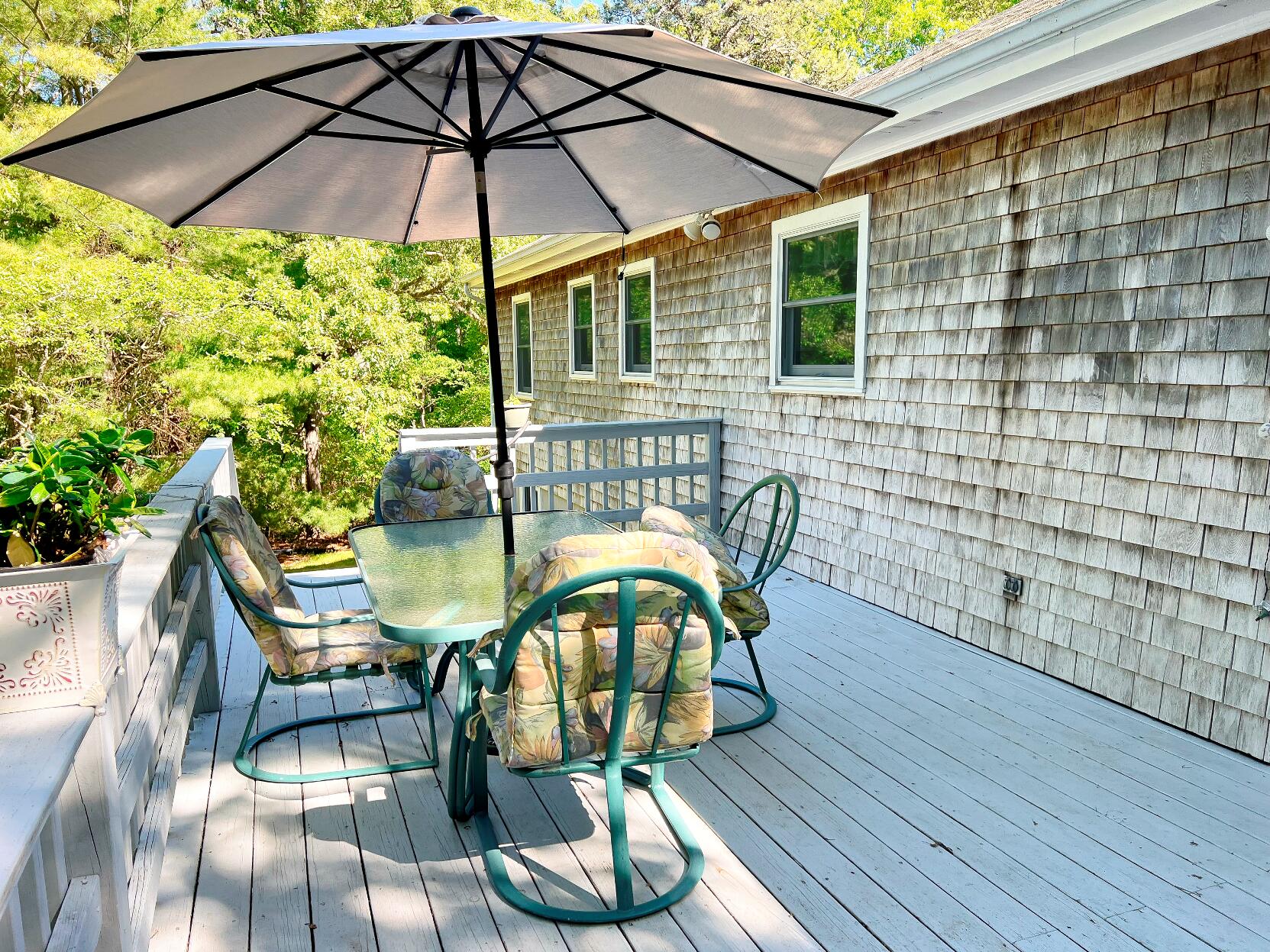 199 Timberlane Drive Brewster, MA 02631 - Photo 9 of 44 a view of balcony with an outdoor seating