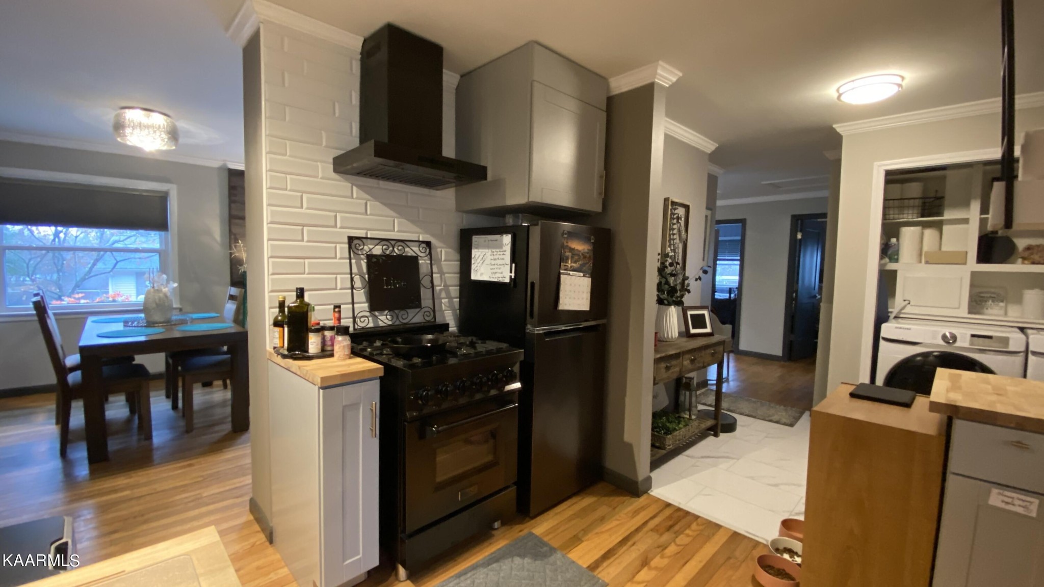 108 East Malta Road Oak Ridge, TN 37830 - Photo 14 of 53 a kitchen with stainless steel appliances kitchen island granite countertop a stove refrigerator and cabinets
