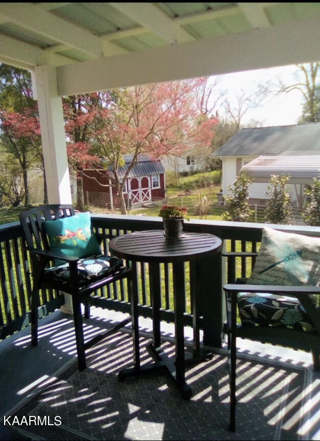 108 East Malta Road Oak Ridge, TN 37830 - Photo 3 of 53 a view of a chairs and table in the balcony