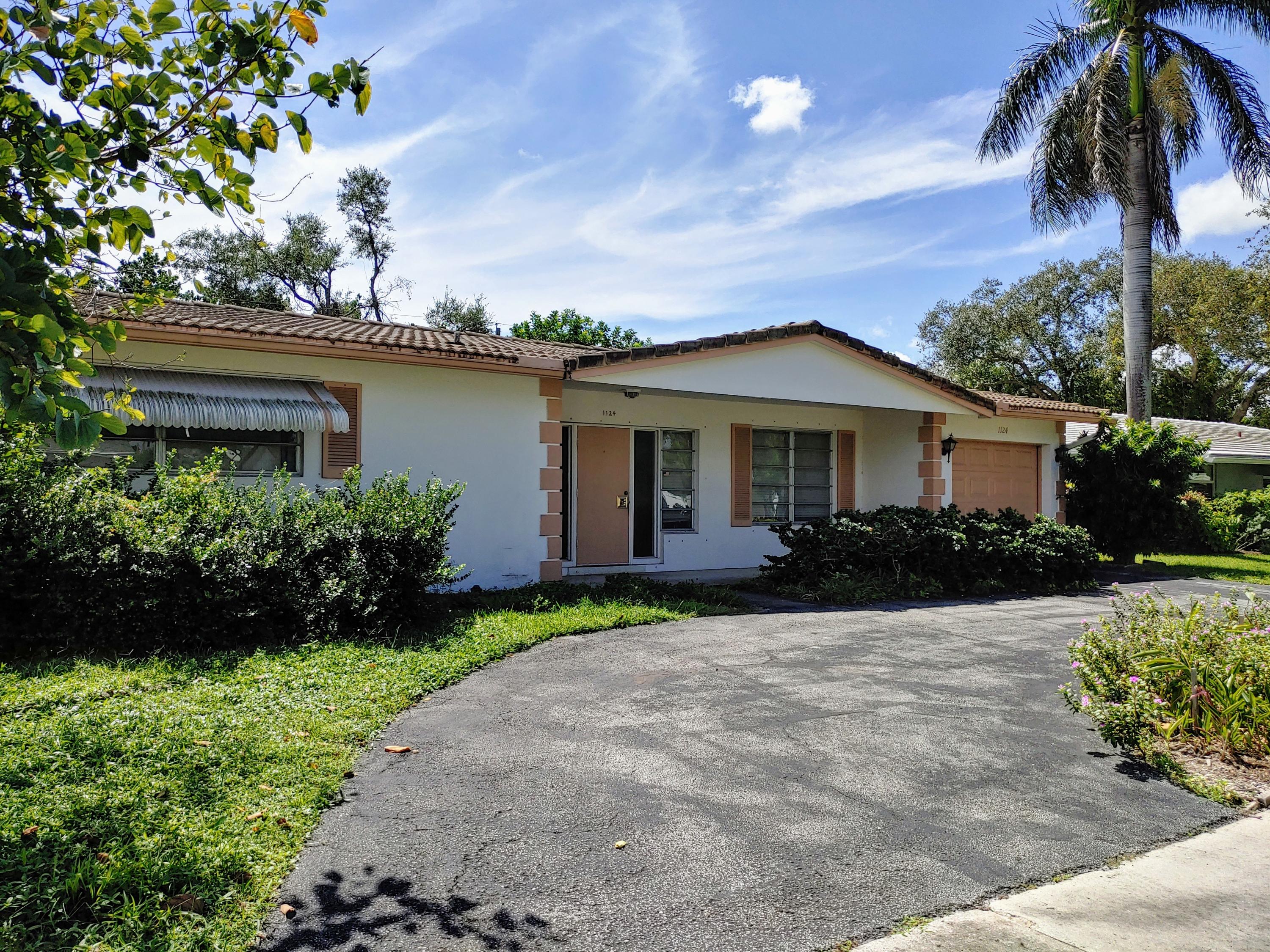 1124 Southwest 14th Street Boca Raton, FL 33486 - Photo 1 of 1 front exterior photo