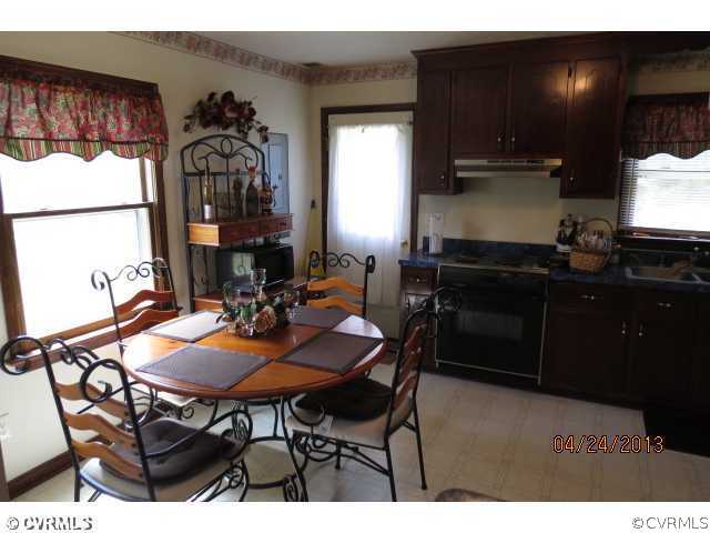2840 Wills Road Ford, VA 23850 - Photo 2 of 4 a view of a dining room with furniture
