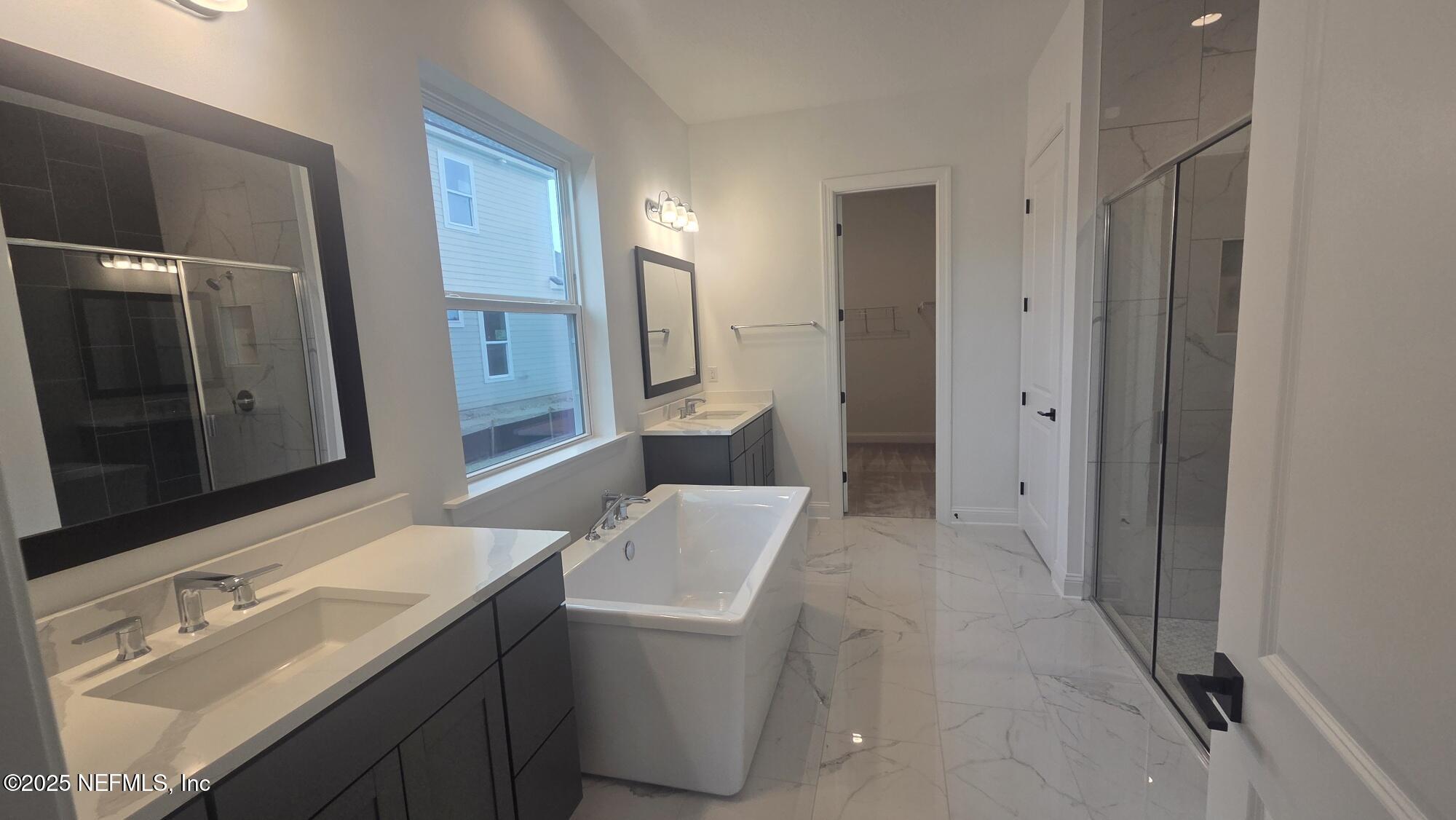 74 Sapling Terrace St. Johns, FL 32259 - Photo 33 of 49 a bathroom with a sink a toilet and mirror