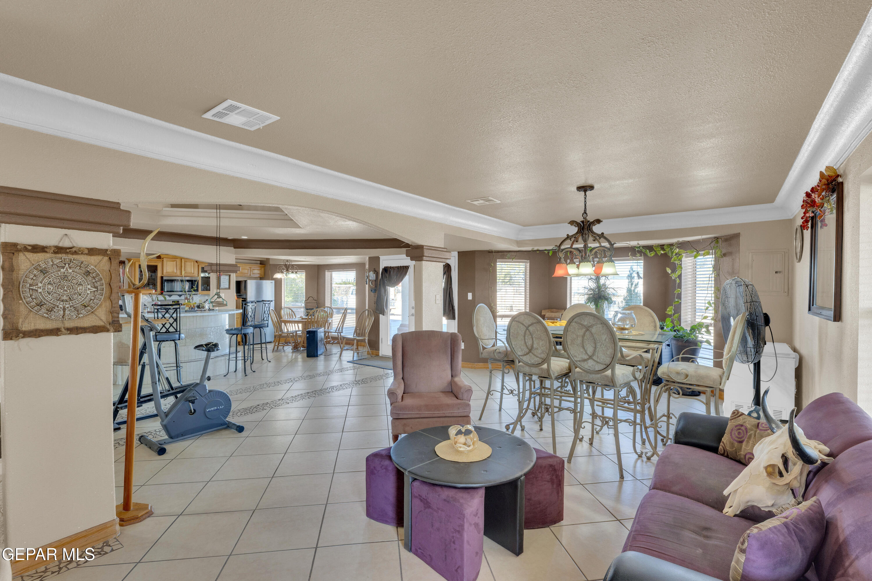 16020 Harrison Road El Paso, TX 79928 - Photo 19 of 56 a very nice looking living room with lots of furniture and a large window