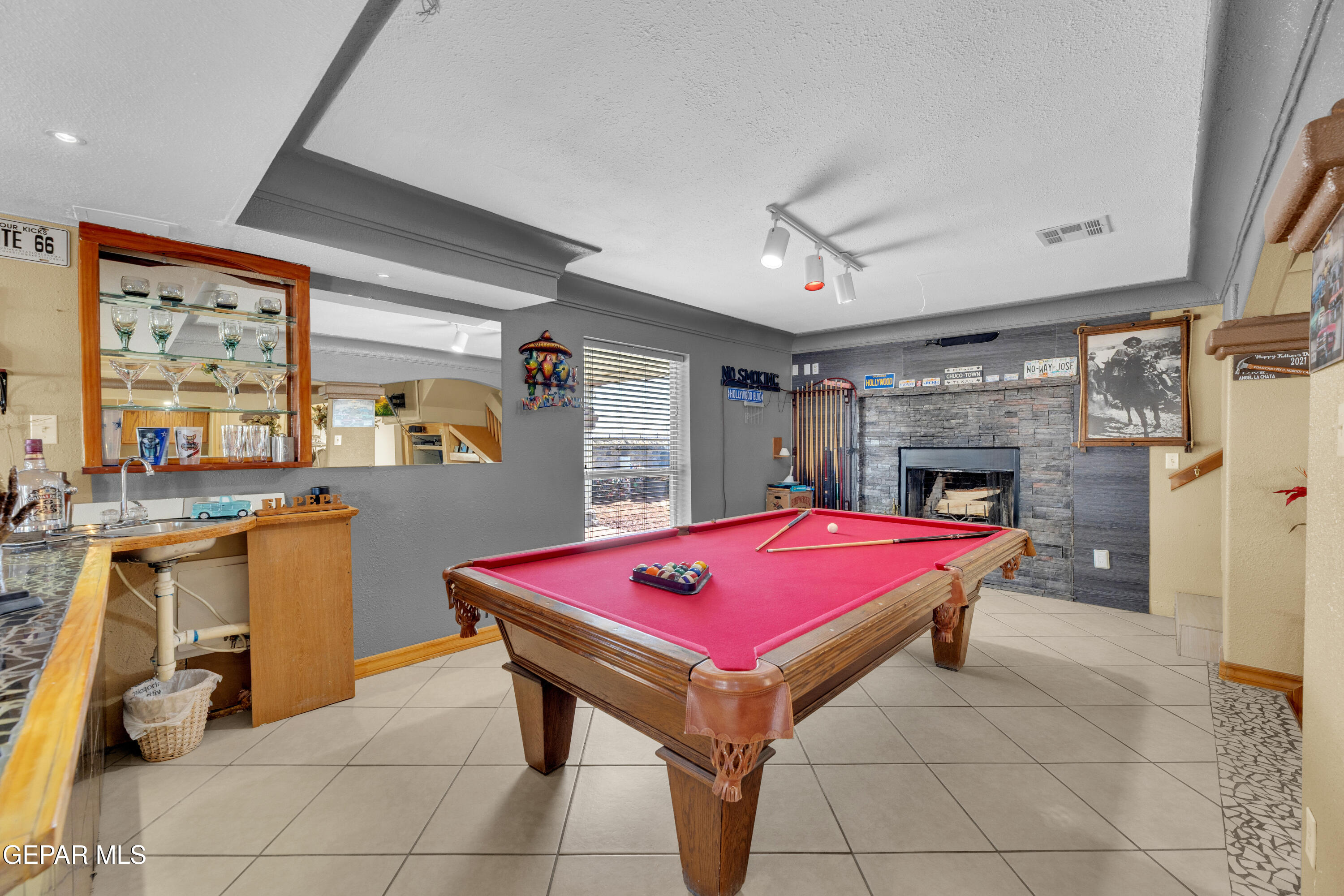16020 Harrison Road El Paso, TX 79928 - Photo 22 of 56 a room with pool table and flat screen tv