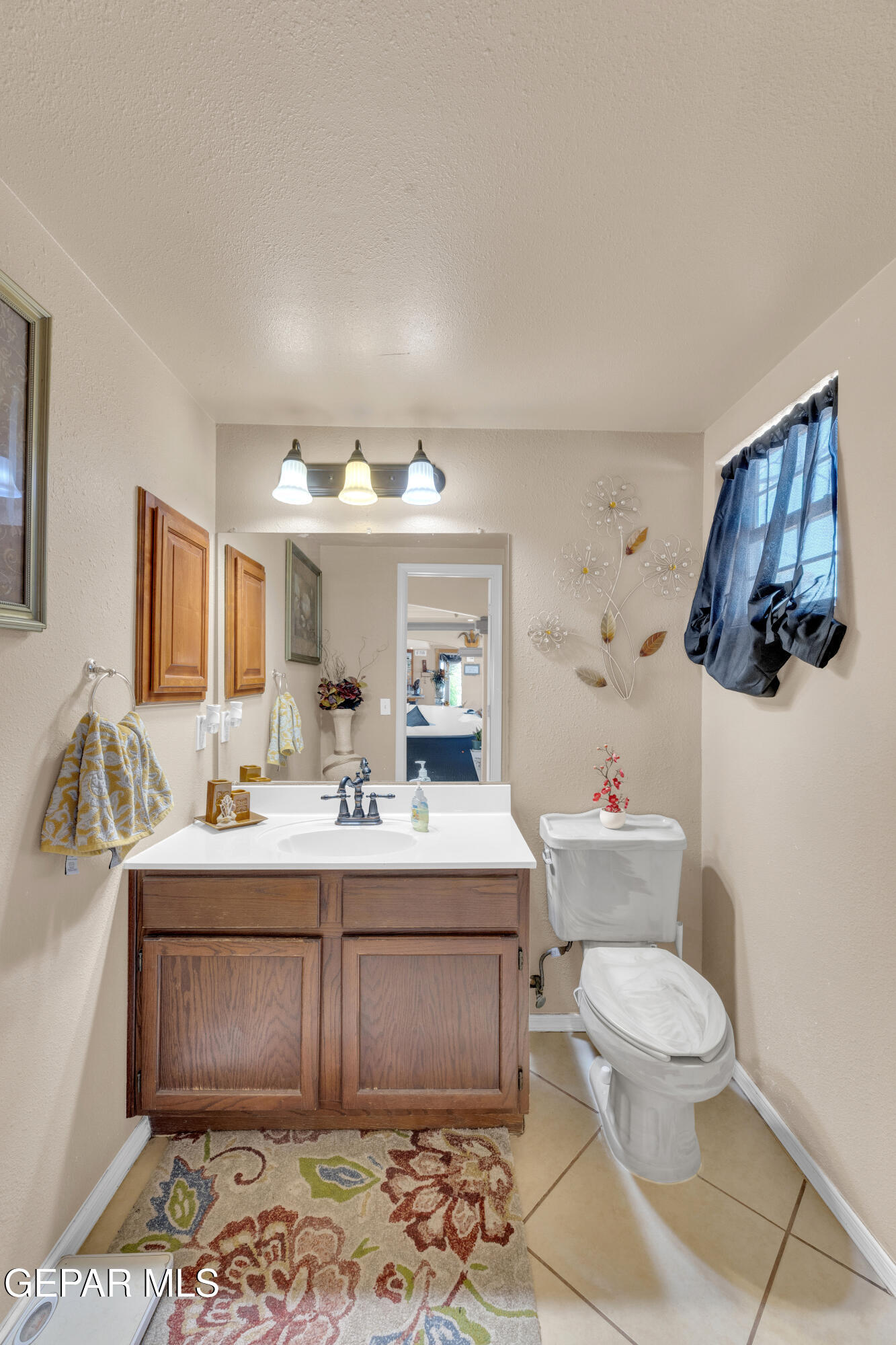 16020 Harrison Road El Paso, TX 79928 - Photo 24 of 56 a room with a sink and a mirror