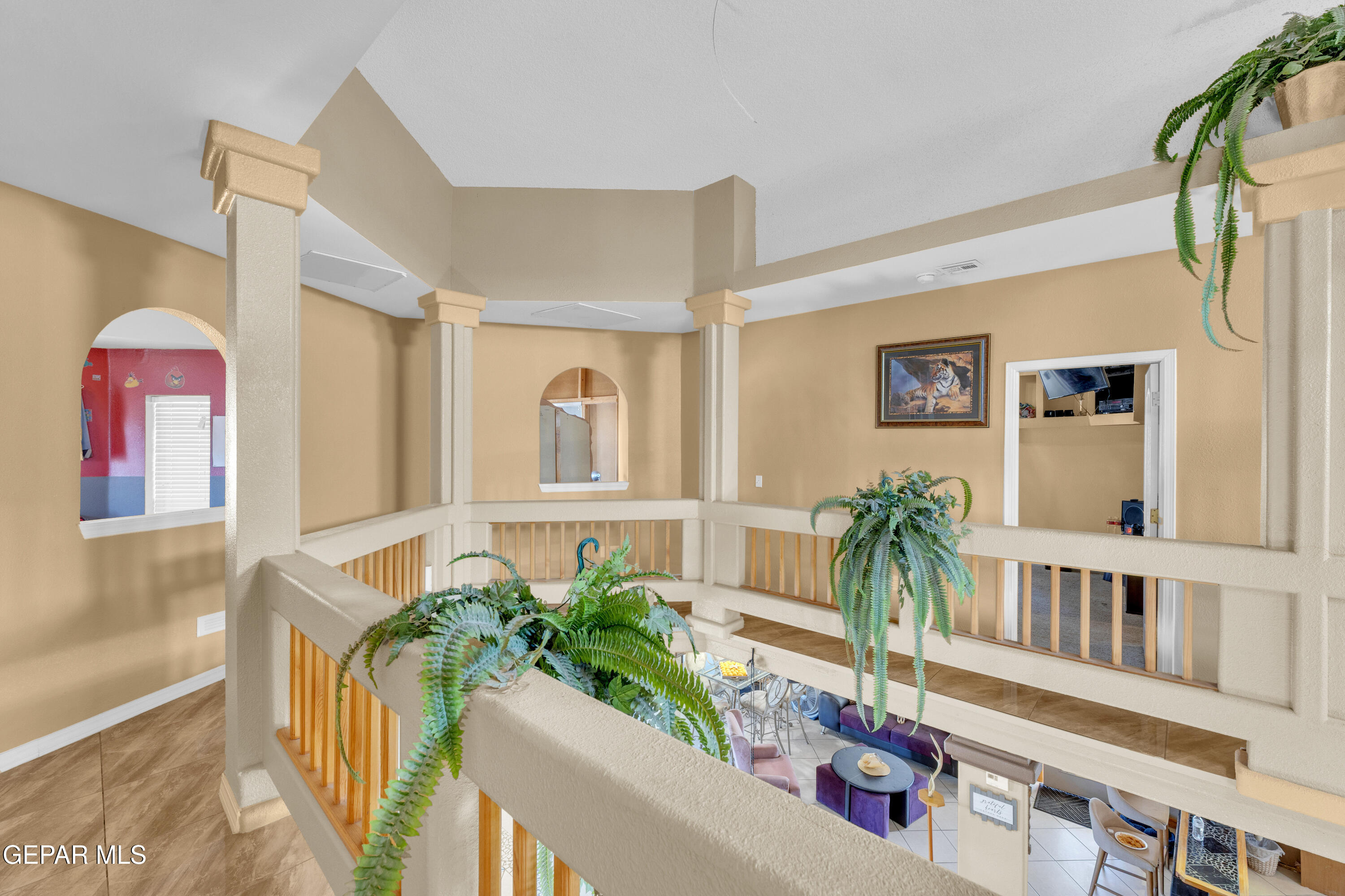 16020 Harrison Road El Paso, TX 79928 - Photo 25 of 56 a living room with furniture and a potted plant