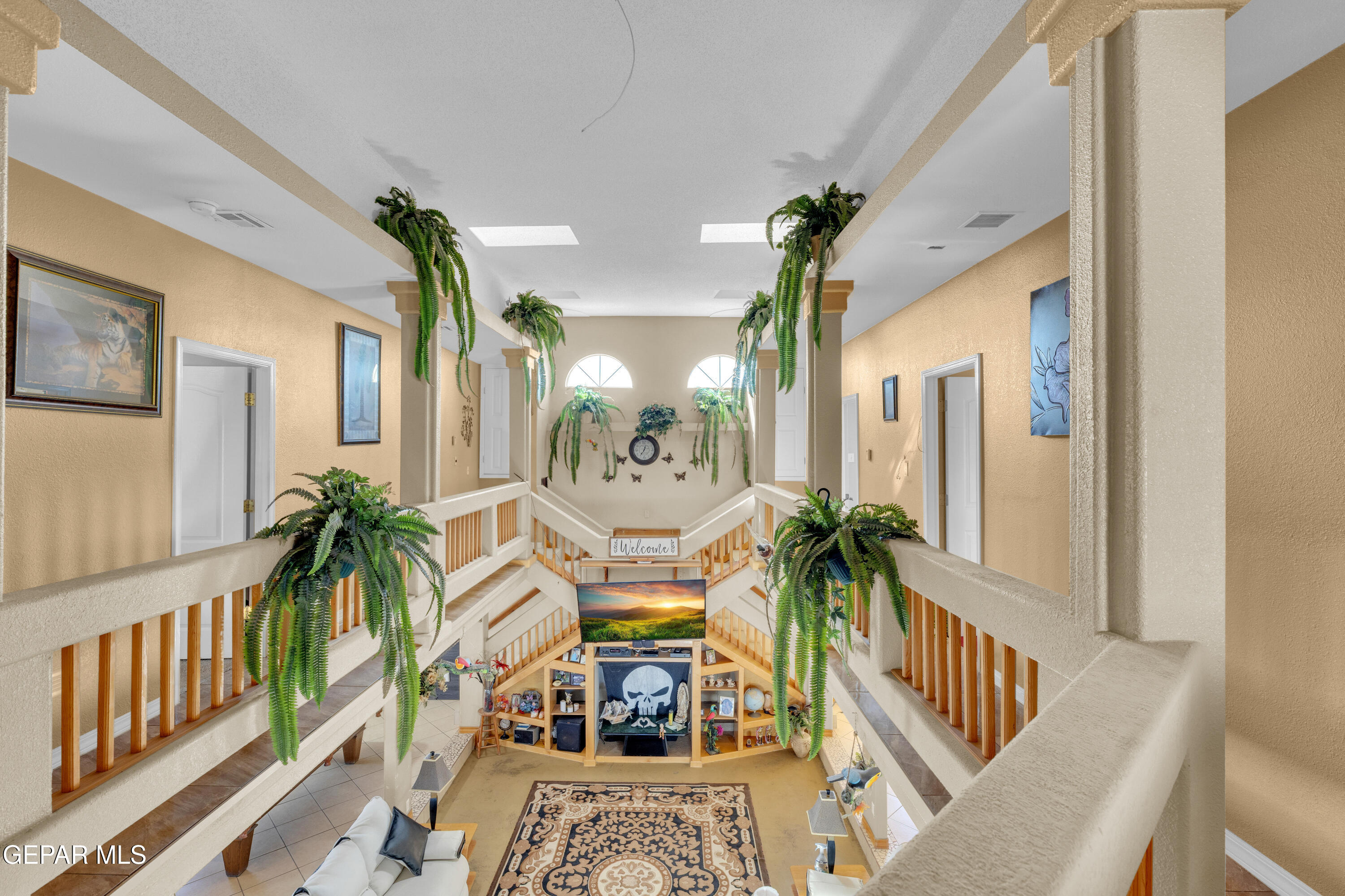 16020 Harrison Road El Paso, TX 79928 - Photo 26 of 56 a living room with furniture and a wooden floor