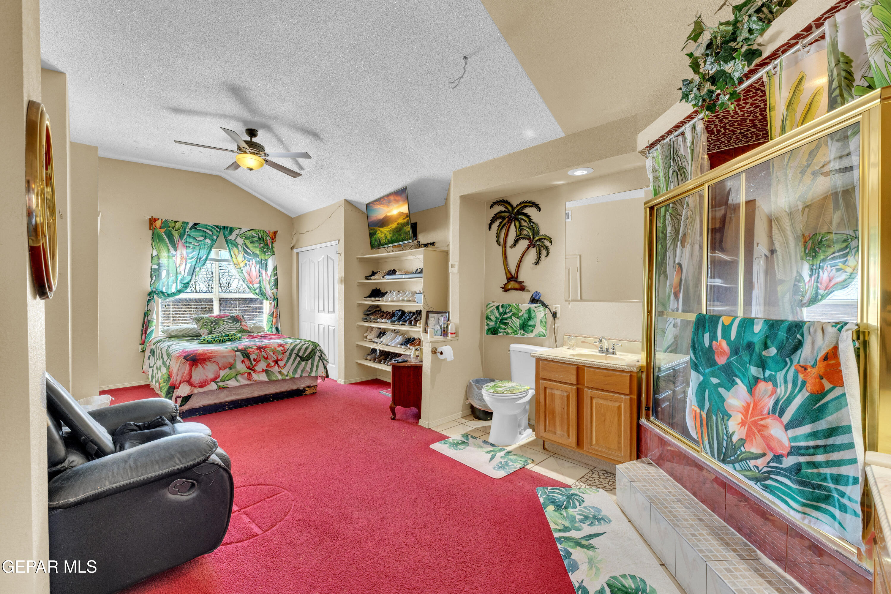 16020 Harrison Road El Paso, TX 79928 - Photo 39 of 56 a living room with furniture and a flat screen tv