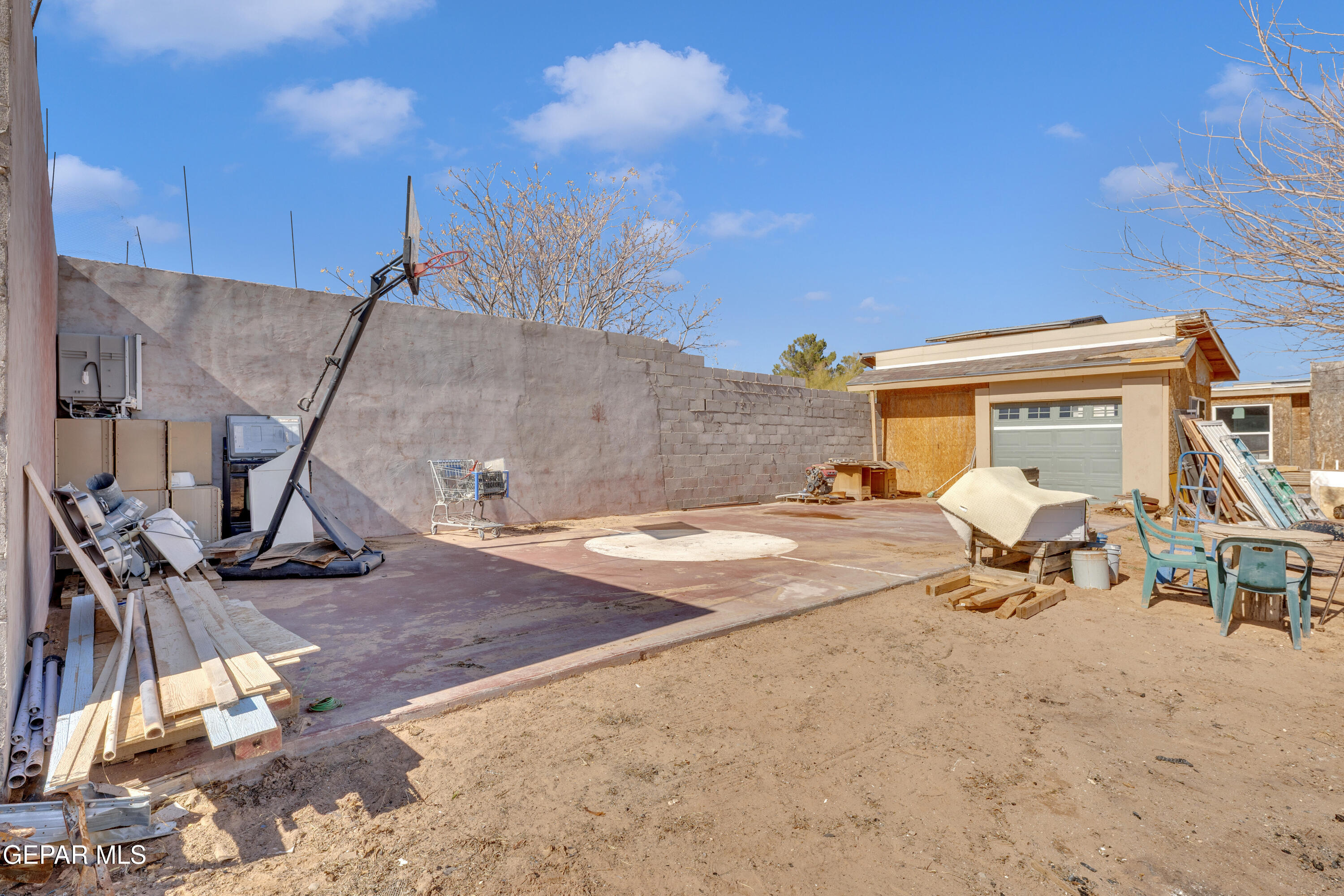 16020 Harrison Road El Paso, TX 79928 - Photo 47 of 56 a house with swimming pool in front of it