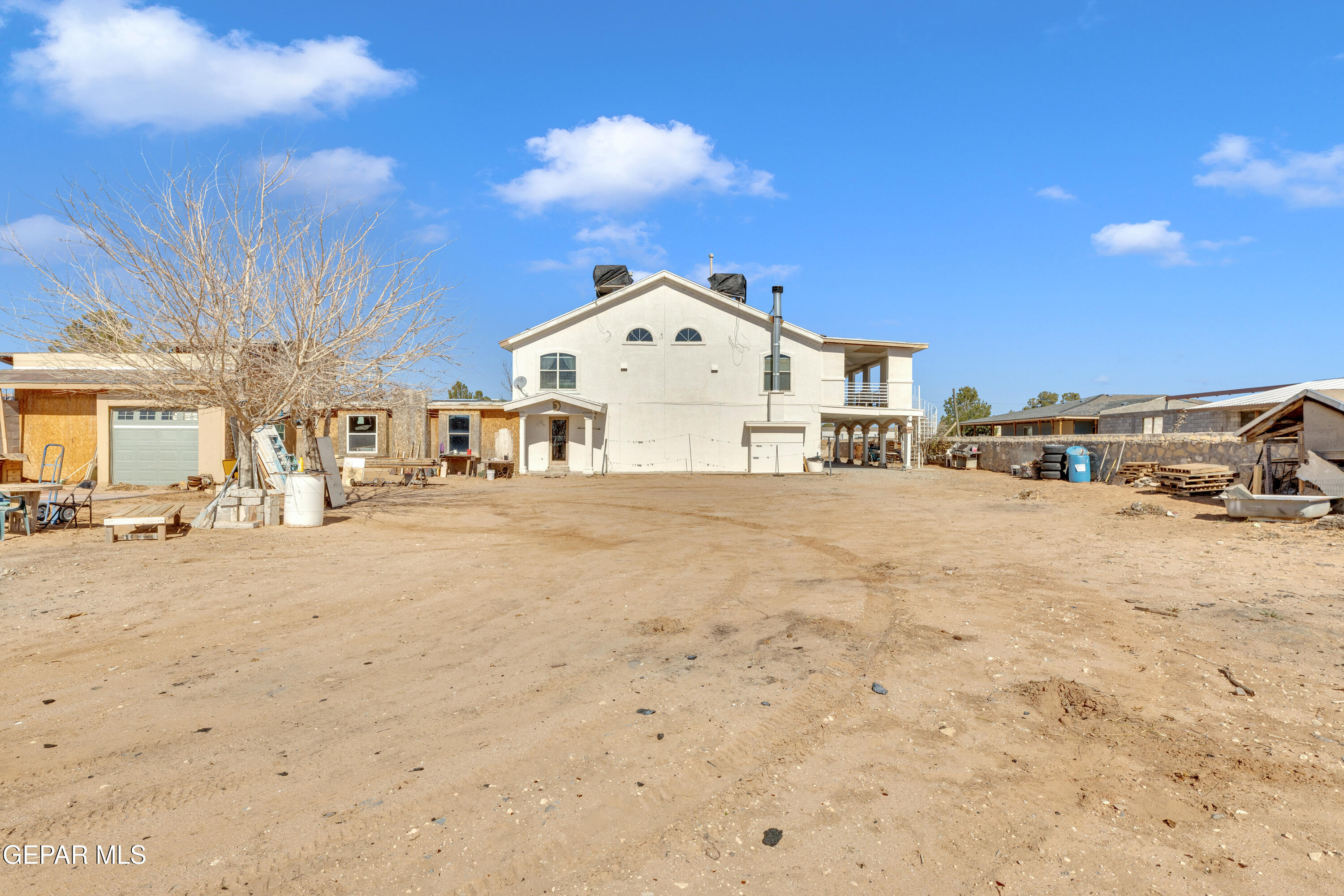 16020 Harrison Road El Paso, TX 79928 - Photo 48 of 56 a view of a very nice looking house with a yard