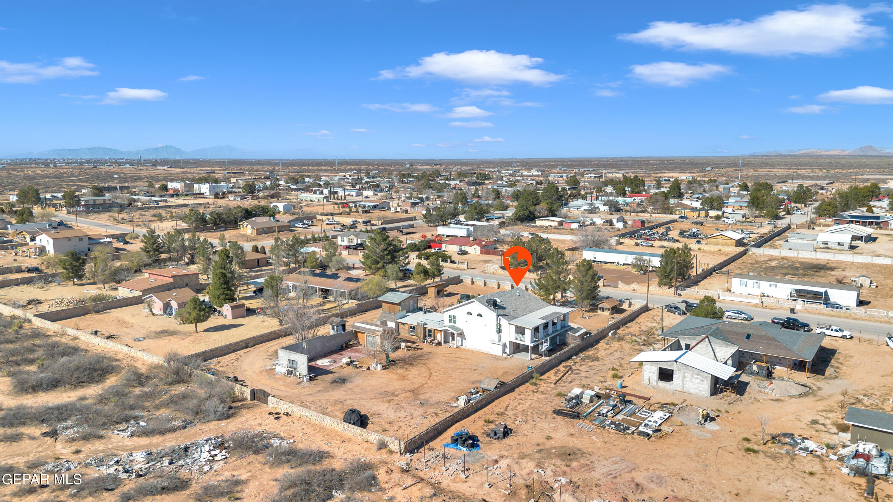 16020 Harrison Road El Paso, TX 79928 - Photo 53 of 56 an aerial view of residential building with parking space
