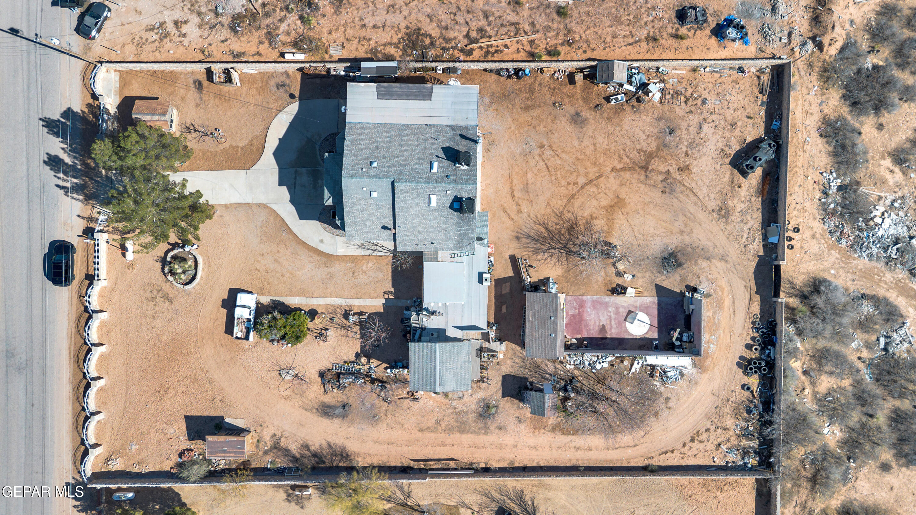 16020 Harrison Road El Paso, TX 79928 - Photo 56 of 56 an aerial view of residential houses with outdoor space