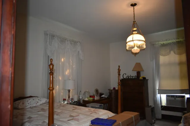 a view of a very nice looking dining room with wooden floor