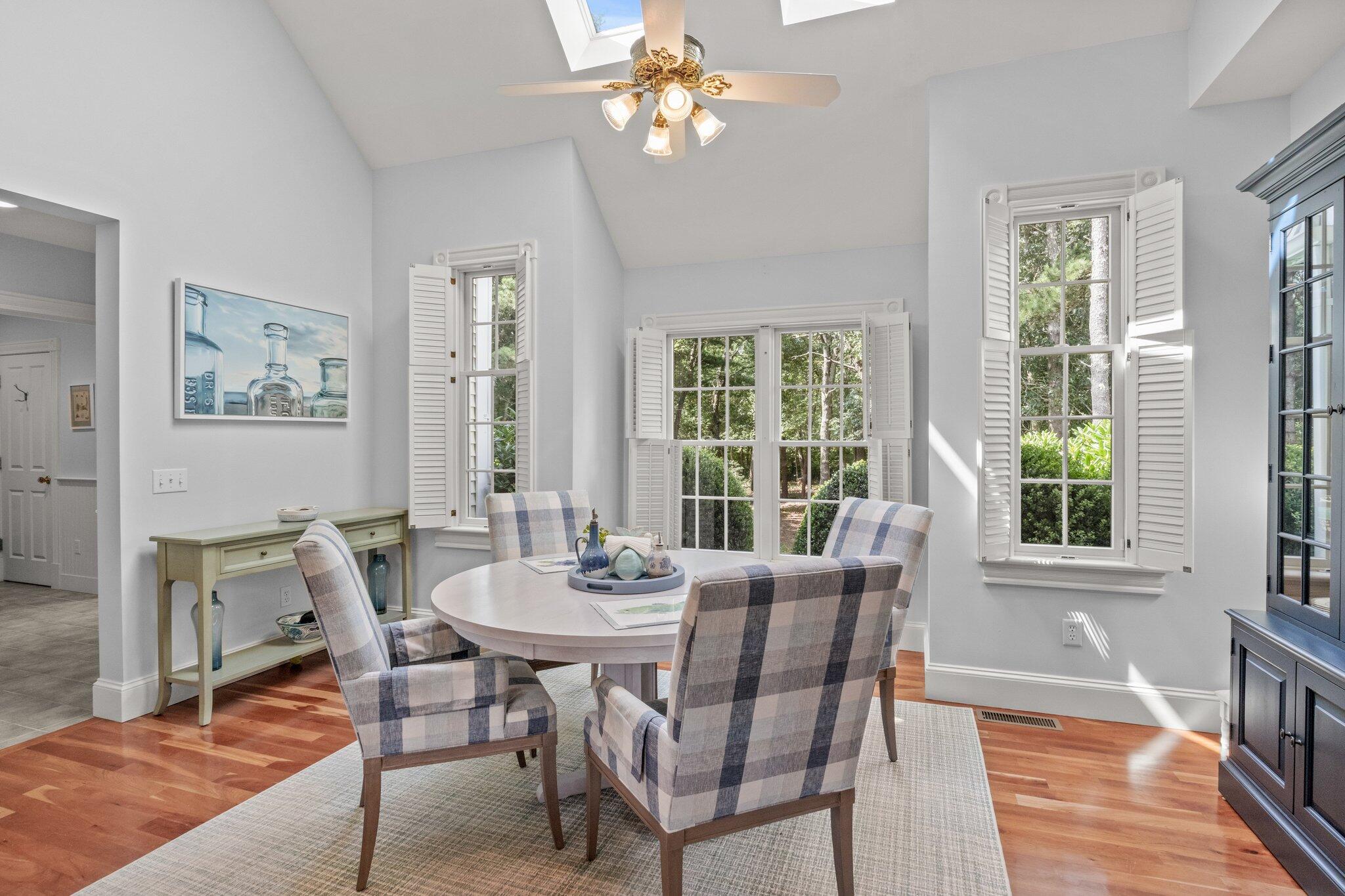 63 Farm Valley Road Osterville, MA 02655 - Photo 11 of 42 a view of a dining room with furniture window and wooden floor