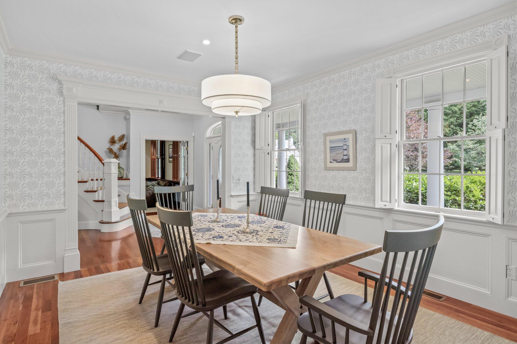 63 Farm Valley Road Osterville, MA 02655 - Photo 18 of 42 a view of a dining room with furniture window and wooden floor