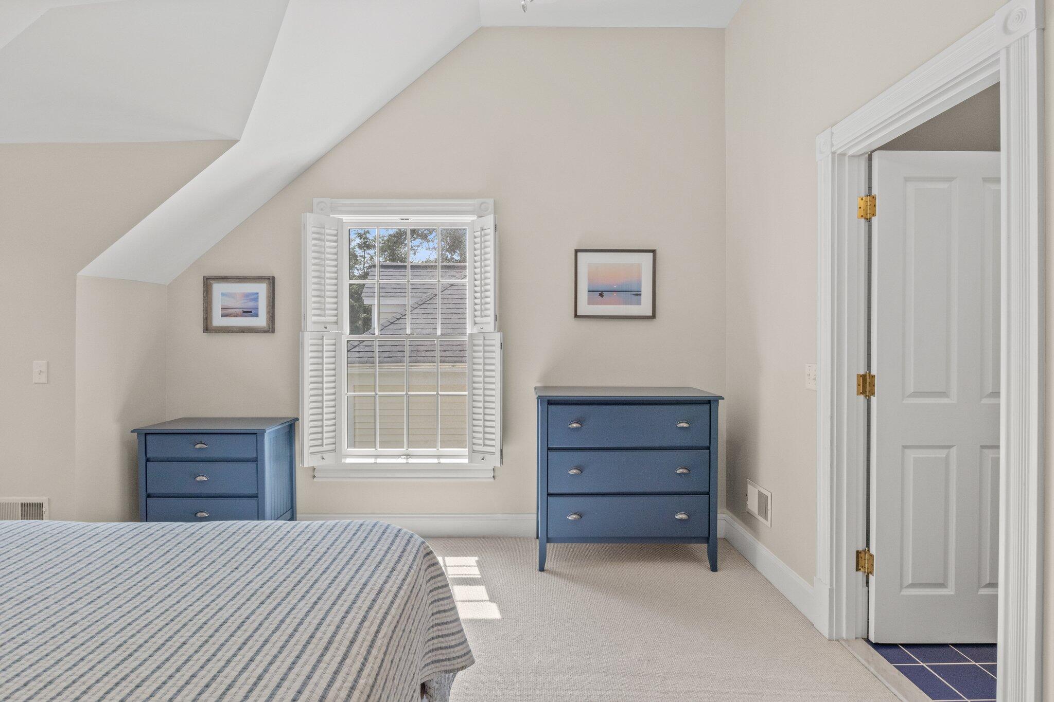63 Farm Valley Road Osterville, MA 02655 - Photo 30 of 42 a bedroom with a bed and a window