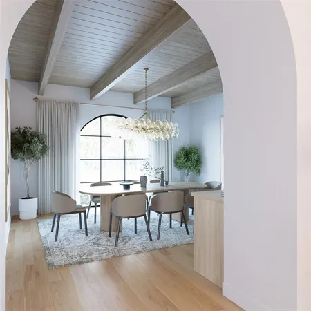 a view of a dining room with furniture and chandelier