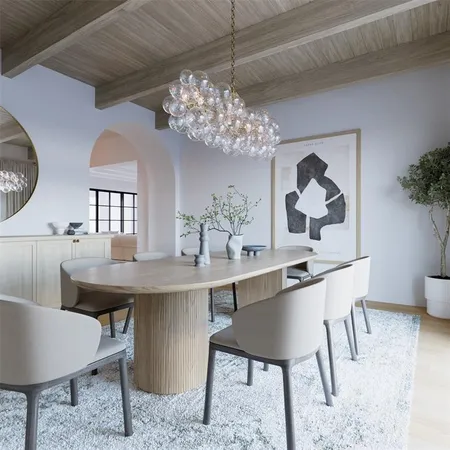 a view of a table and chairs in a room