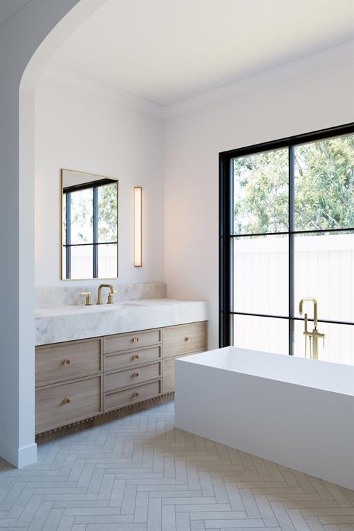 6960 Joyce Way Dallas, TX 75225 - Photo 17 of 18 a bathroom with a large tub sink vanity and windows