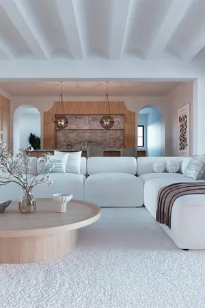 a living room with a couch and a large window