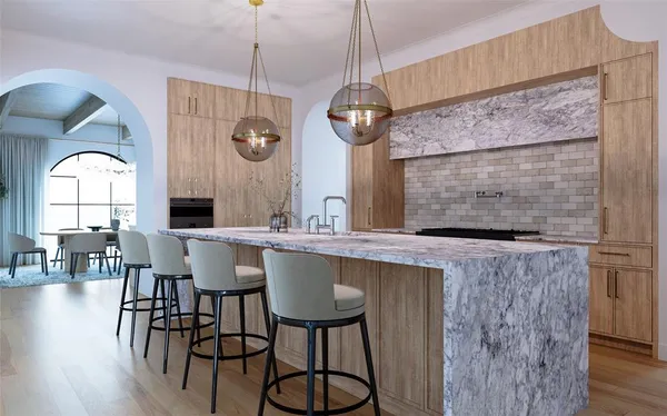 a view of living room with granite countertop furniture and wooden floor