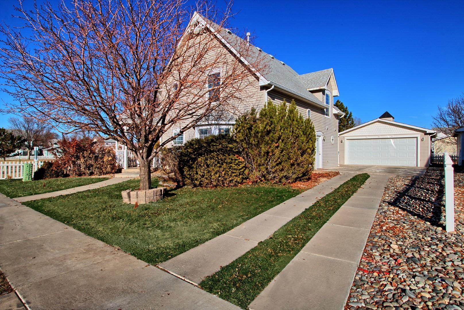 1209 Windsor Park Drive Fruita, CO 81521 - Photo 18 of 26 a view of a back yard of the house
