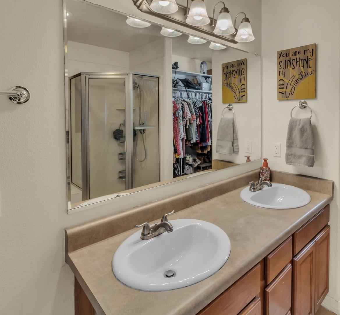 1209 Windsor Park Drive Fruita, CO 81521 - Photo 8 of 26 a bathroom with a sink and a mirror