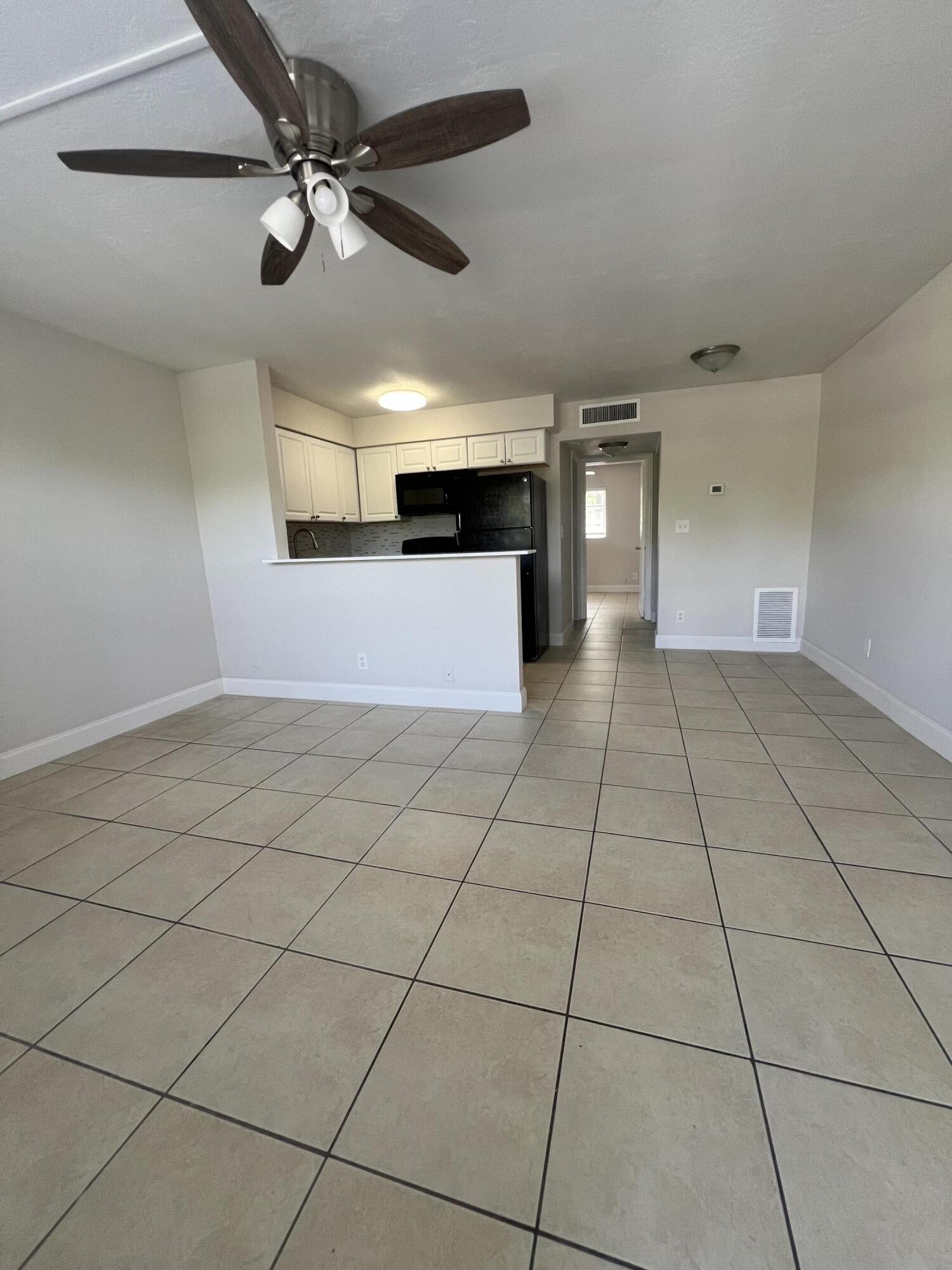 4670 Northeast 5th Avenue, Unit 5 Boca Raton, FL 33431 - Photo 2 of 8 IMG_6903