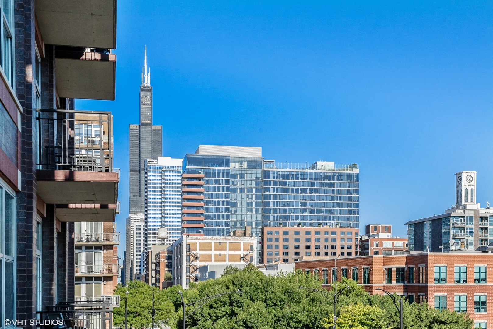 1000 West Adams Street, Unit 411 Chicago, IL 60607 - Photo 2 of 4 a view of a city with tall buildings