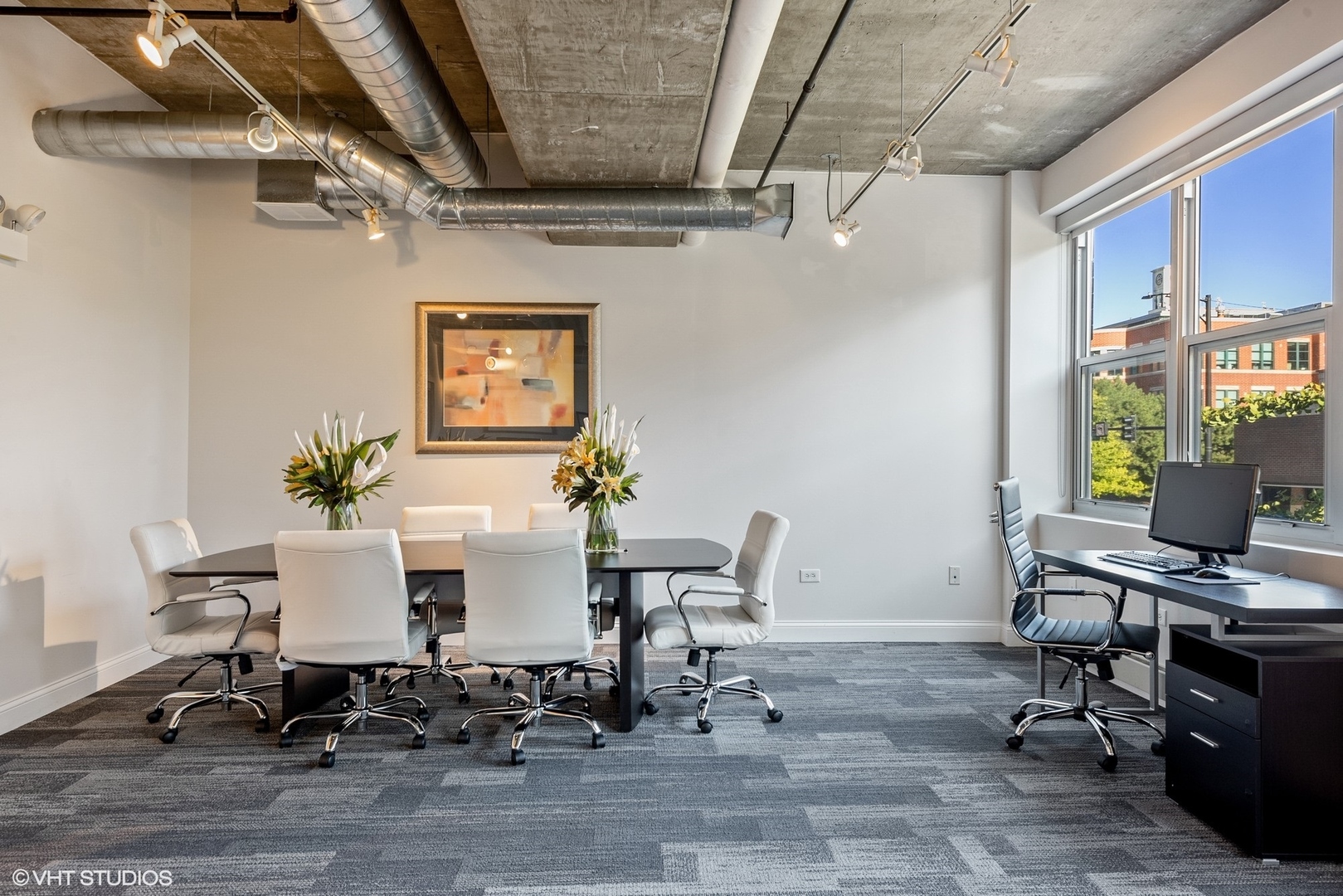 1000 West Adams Street, Unit 411 Chicago, IL 60607 - Photo 4 of 4 a view of a workspace with furniture
