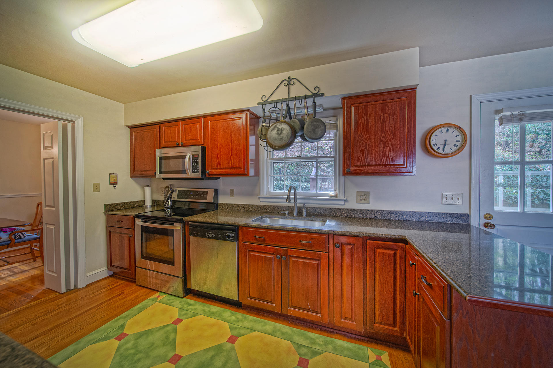 3120 Stoneridge Road Southwest Roanoke, VA 24014 - Photo 11 of 35 a kitchen with stainless steel appliances granite countertop a sink and cabinets