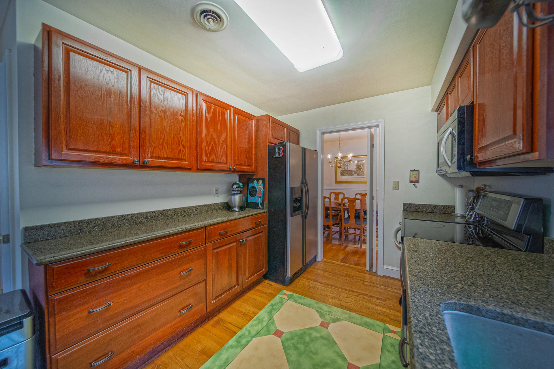 3120 Stoneridge Road Southwest Roanoke, VA 24014 - Photo 13 of 35 a kitchen with stainless steel appliances granite countertop a stove and a sink