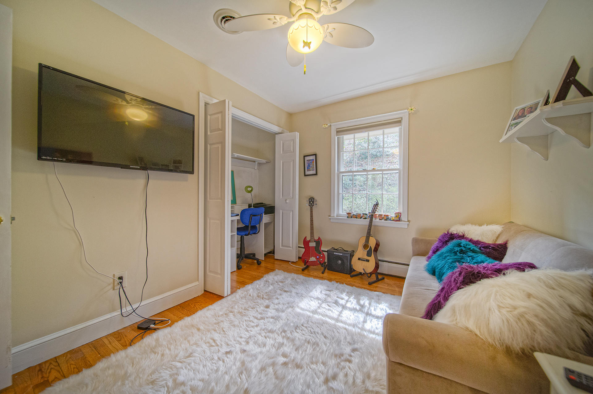 3120 Stoneridge Road Southwest Roanoke, VA 24014 - Photo 14 of 35 a living room with furniture and a flat screen tv