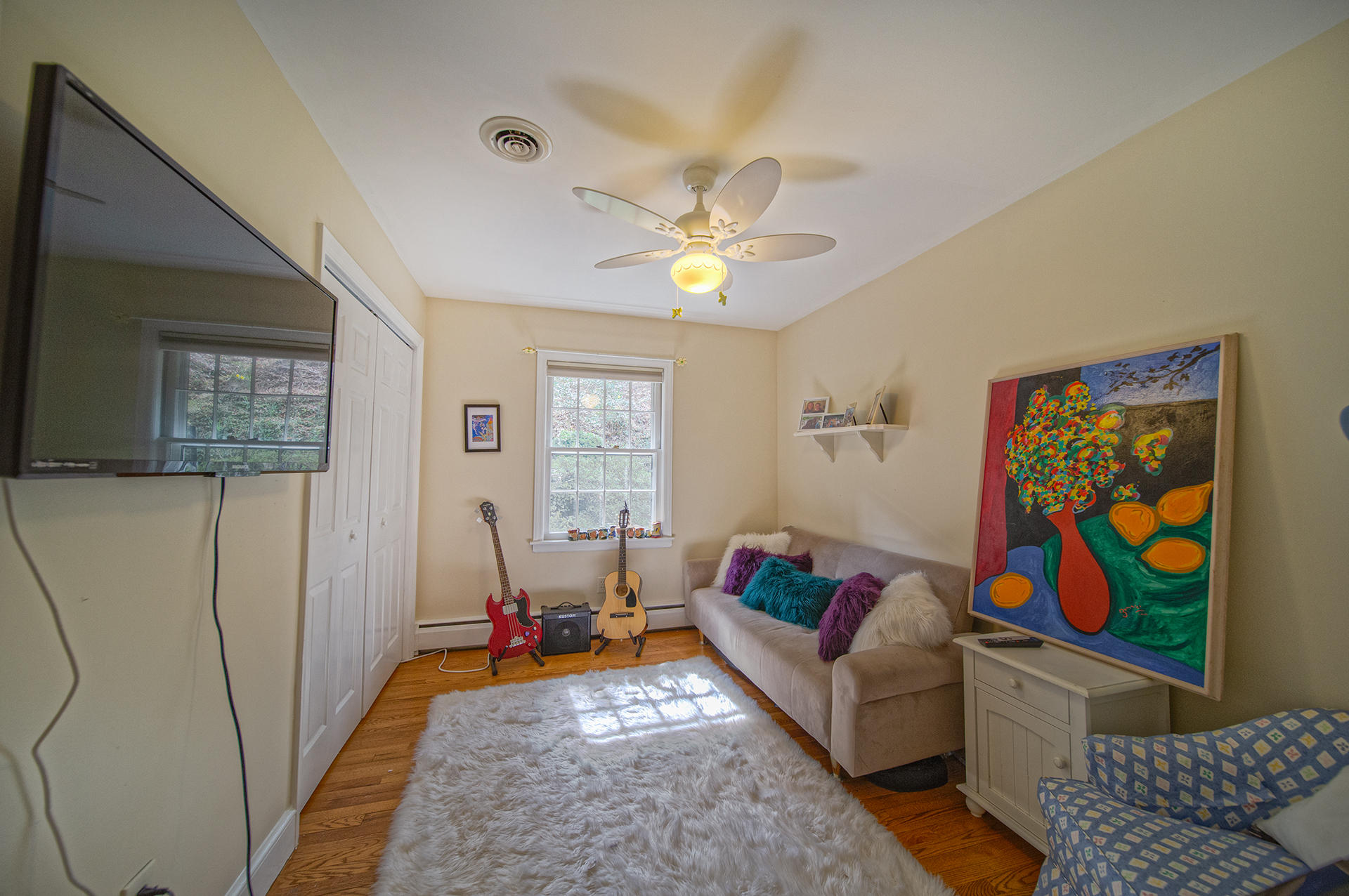 3120 Stoneridge Road Southwest Roanoke, VA 24014 - Photo 15 of 35 a living room with furniture and flat screen tv