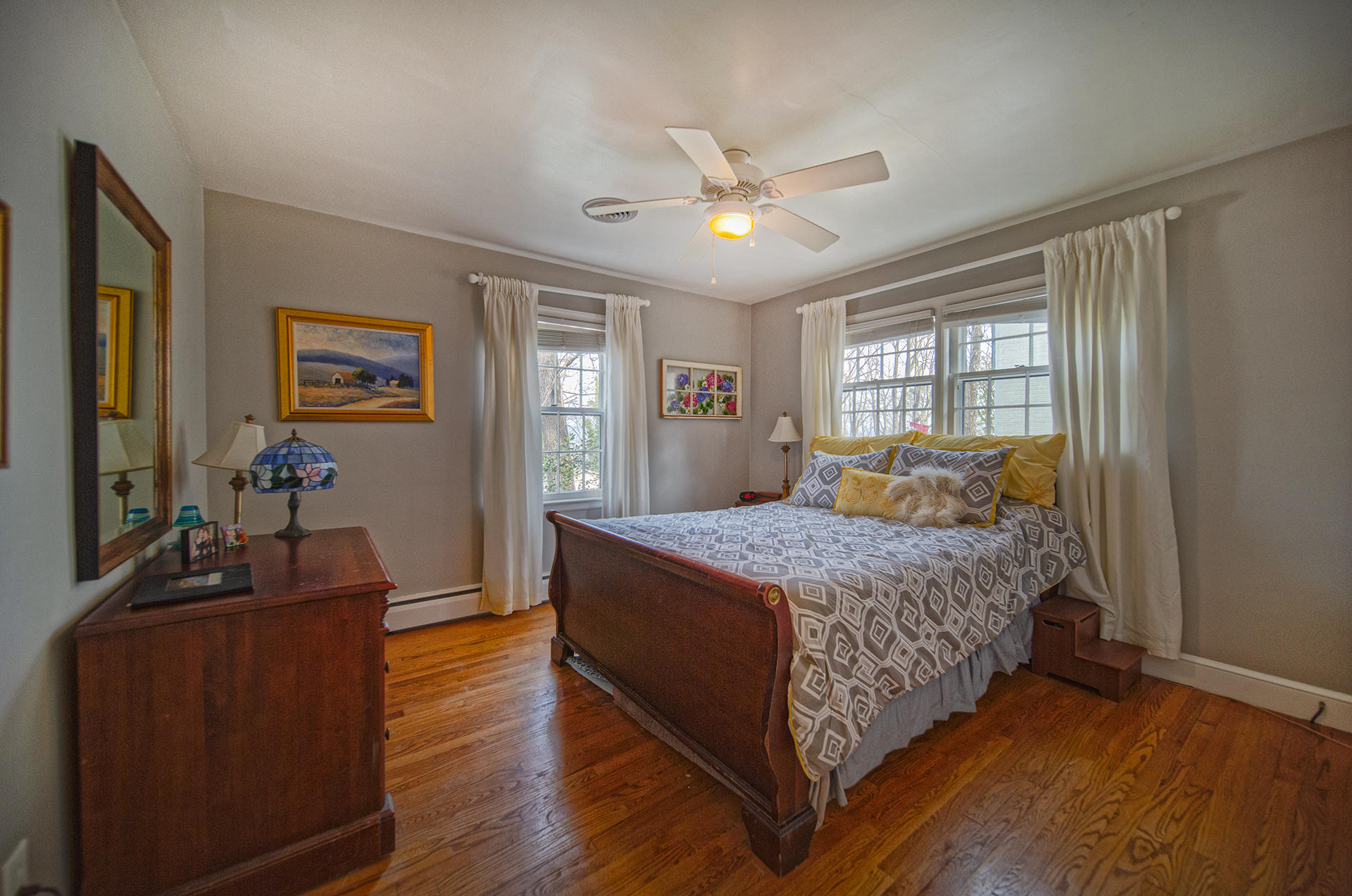 3120 Stoneridge Road Southwest Roanoke, VA 24014 - Photo 16 of 35 a bedroom with a bed and wooden floor