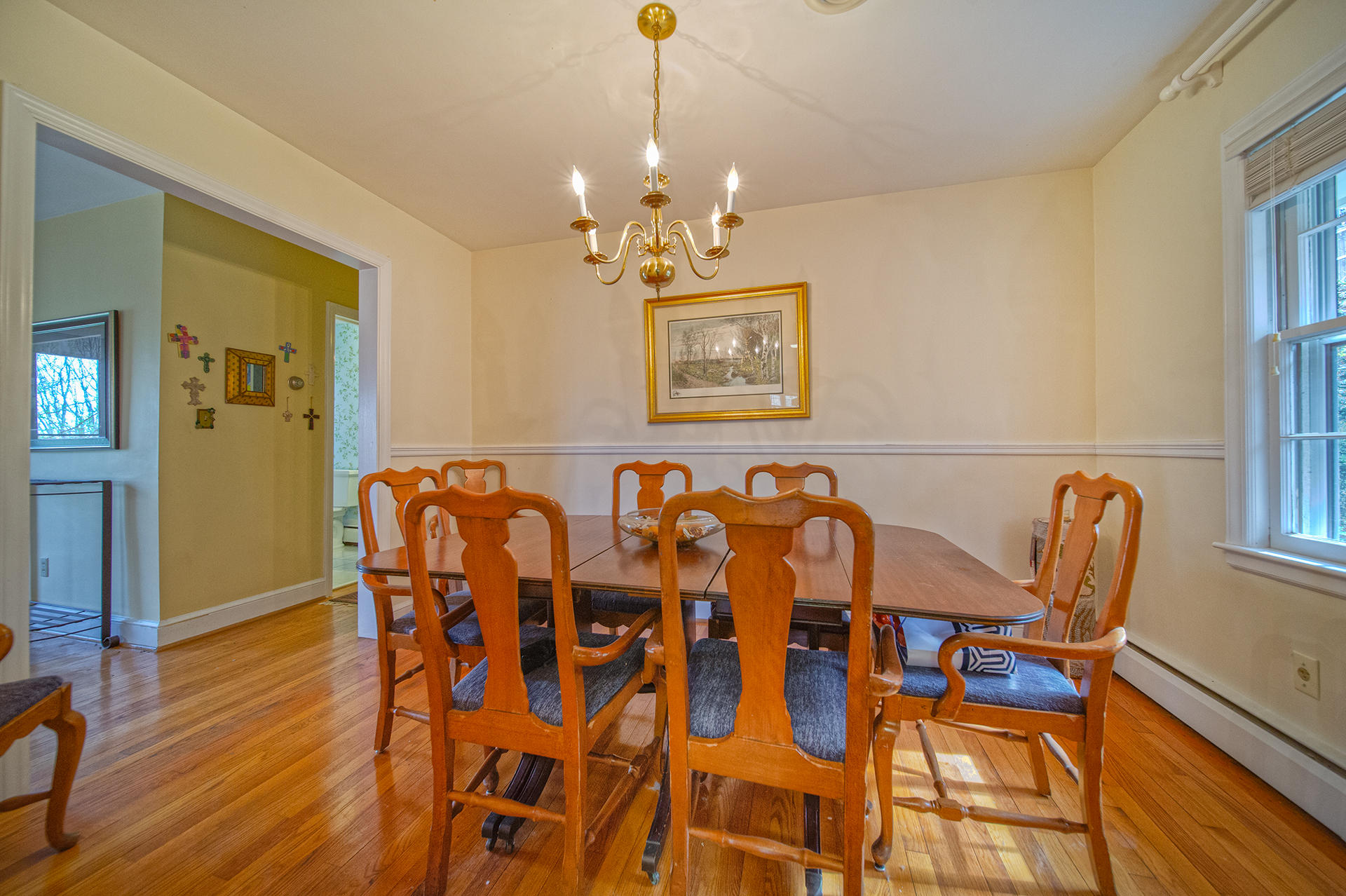 3120 Stoneridge Road Southwest Roanoke, VA 24014 - Photo 3 of 35 a view of a dining room with furniture wooden floor and a chandelier