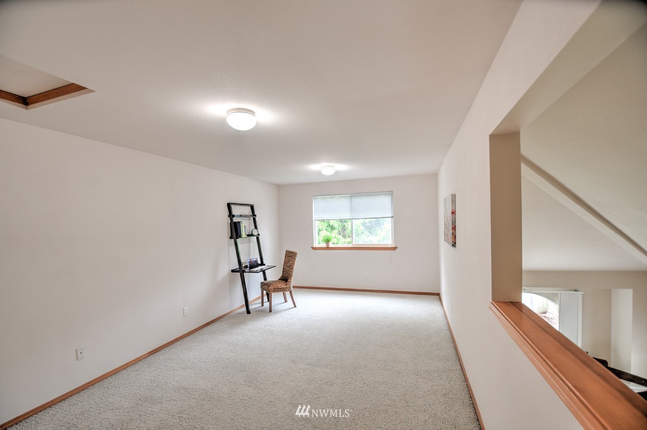 2201 192nd Street Southeast, Unit N2 Bothell, WA 98012 - Photo 28 of 39 a view of empty room with windows